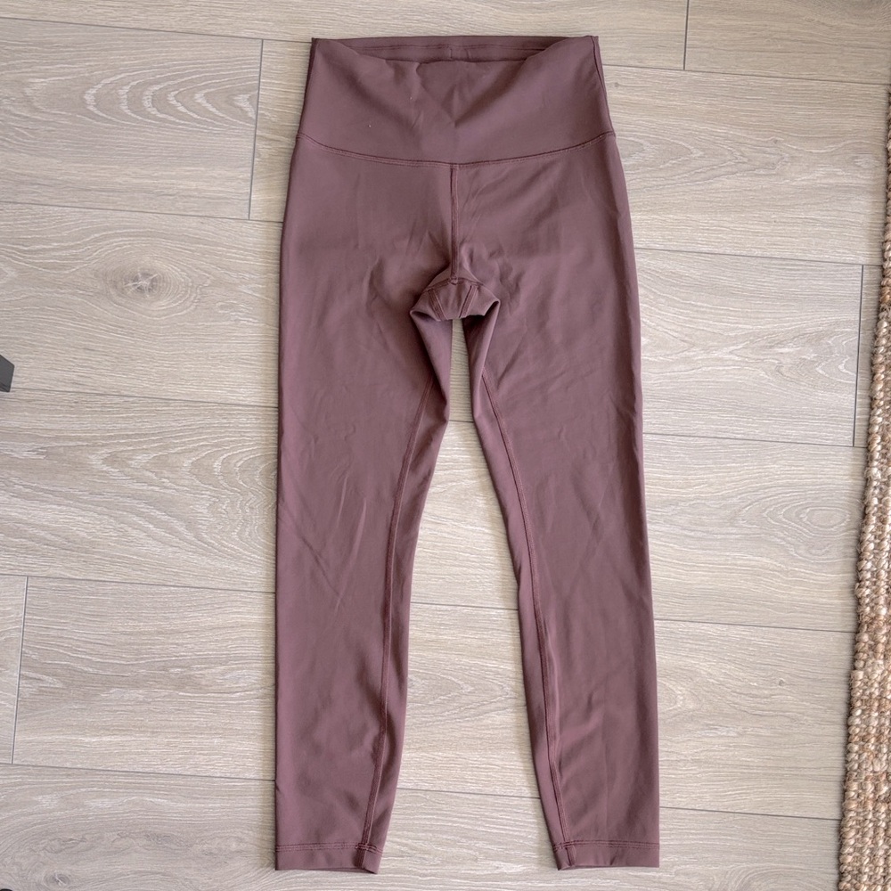 Lululemon Wonder Train High-Rise Tight 25” in size 6